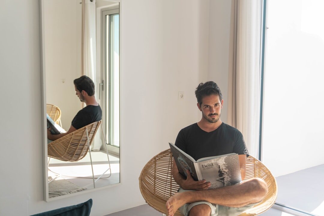 man practicing speech in mirror