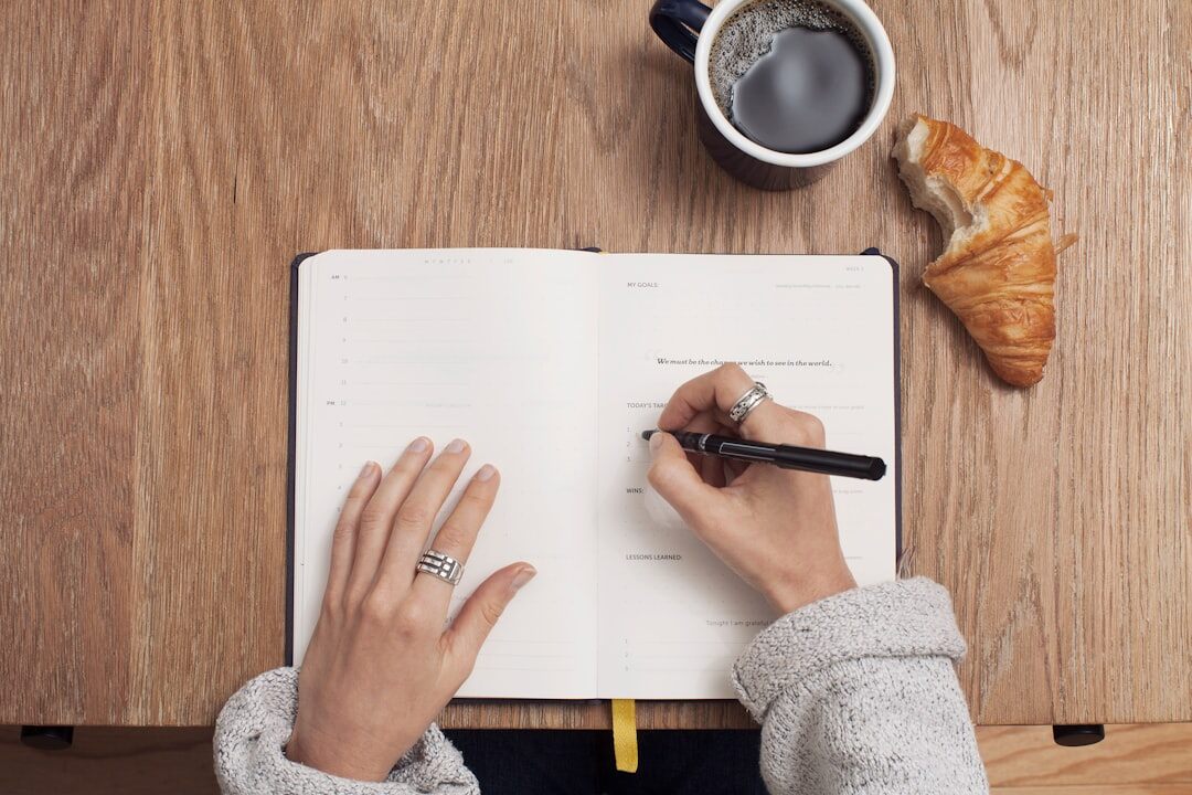 person writing notes