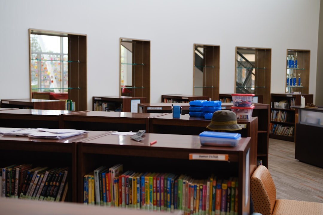person reading book in quiet room