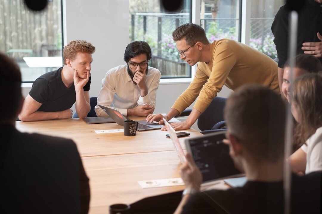 Group of people in a collaborative workshop discussing ideas