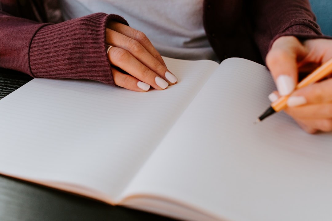 person journaling emotions